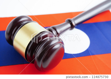 Laos, Legal, justice and agreement, wooden court gavel on flag. Laos, Legal, justice and agreement, wooden court gavel on flag. 114875730