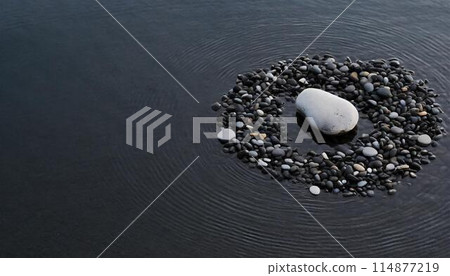 Pebbles and water ripples Pebbles and water ripples 114877219