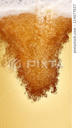 Poster. Textured photo. Close-up view of beer poured, capturing golden color of beverage and creamy texture of foam. Abstract background. Poster. Textured photo. Close-up view of beer poured, capturing golden color of beverage and creamy texture of foam. Abstract background. 114877657