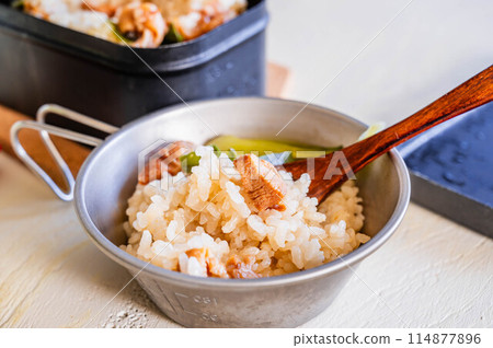 Rice cooked in a Sierra cup 114877896