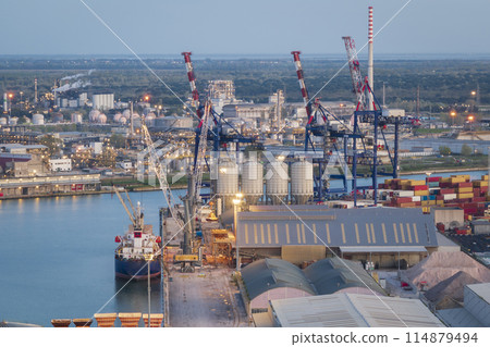 amazing aerial view close up of the industrial and port area of Ravenna at night amazing aerial view close up of the industrial and port area of Ravenna at night 114879494