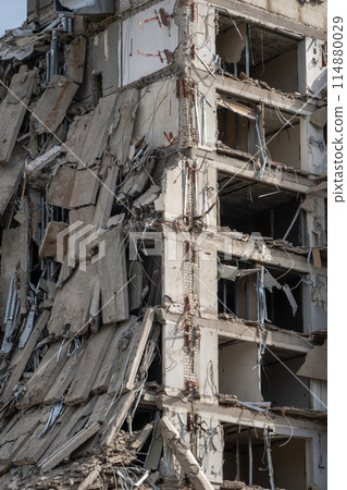 Collapsed urban building after demolition or natural disaster Collapsed urban building after demolition or natural disaster 114880029