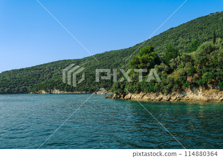 Sea view of coastline with vivid green plantation in Lefkada Ionian Island Greece. 114880364