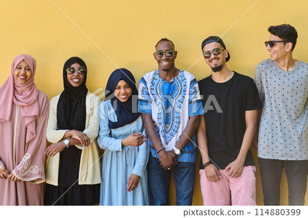 Urban Unity: Vibrant Diversity People in Front of the Yellow Wall 114880399