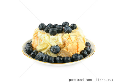 Meringue cake with blueberries isolated on white. Meringue cake with blueberries isolated on white. 114880494