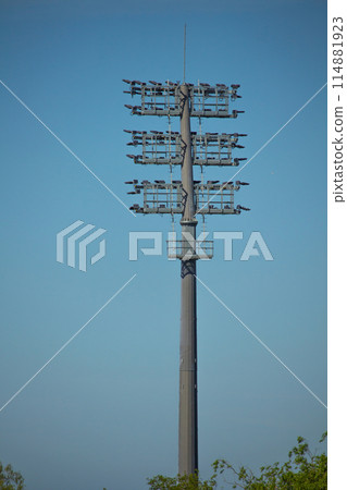 Sports stadium lighting system. The lights of a football stadium Sports stadium lighting system. The lights of a football stadium 114881923