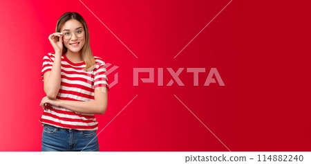 Cheerful geeky cute blond asian female programmer wear glasses smiling joyfully discuss it innovations during conference stand pleased red background, touch eyewear rim grinning pleased Cheerful geeky cute blond asian female programmer wear glasses smiling joyfully discuss it innovations during conference stand pleased red background, touch eyewear rim grinning pleased 114882240