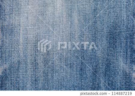 A blue denim fabric with a pattern of zig zags A blue denim fabric with a pattern of zig zags 114887219