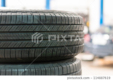 A close up of a tire with the tread showing 114887619