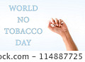 A hand is clenched in a fist with the words "World No Tobacco Day" written below 114887725