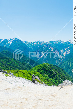 Climbing Mt. Tsurugidake in summer (Kita-Tsurugatake to Mt. Tsurugidake: View of Mt. Yari, Mt. Kasagatake, and Mt. Sugoroku) Climbing Mt. Tsurugidake in summer (Kita-Tsurugatake to Mt. Tsurugidake: View of Mt. Yari, Mt. Kasagatake, and Mt. Sugoroku) 114887828