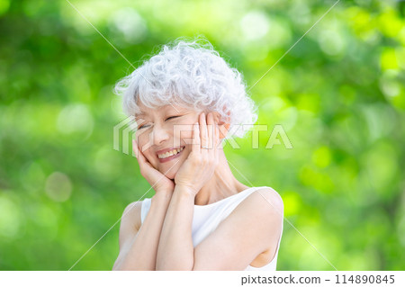 Gray-haired woman, fresh greenery Gray-haired woman, fresh greenery 114890845
