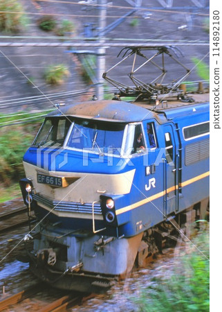 EF66 electric locomotive running on the Tokaido Main Line EF66 electric locomotive running on the Tokaido Main Line 114892180