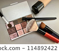 Makeup tools including cosmetic palette and brushes 114892422
