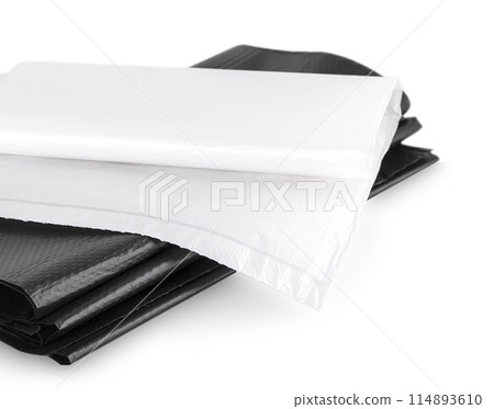 Roll of disposable trash bags isolated over white background 114893610