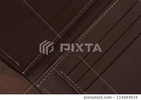 Bespoke full grain brown leather wallet background 114893634