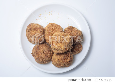 Indian famous tea snacks ooty varkey pastry on white plate on a white background. 114894740