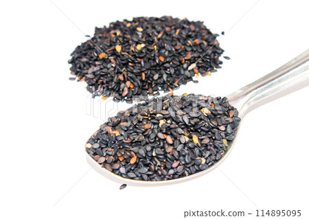 A picture of black Sesame Seeds isolated on white background 114895095