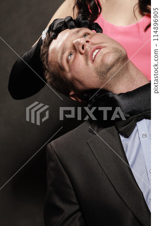 Woman in control of man Woman in control of man 114896905