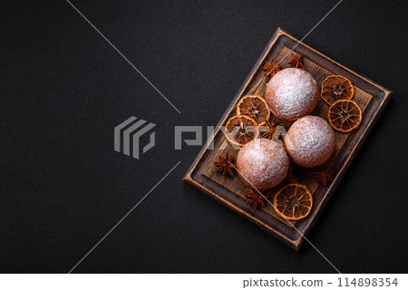Round homemade cheese donuts glazed with citrus flavor Round homemade cheese donuts glazed with citrus flavor 114898354
