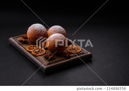 Round homemade cheese donuts glazed with citrus flavor Round homemade cheese donuts glazed with citrus flavor 114898356