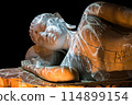 Nirvana white marble reclining Buddha, beautiful, black background. 114899154