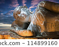 Nirvana white marble reclining Buddha, beautiful sky background. 114899160