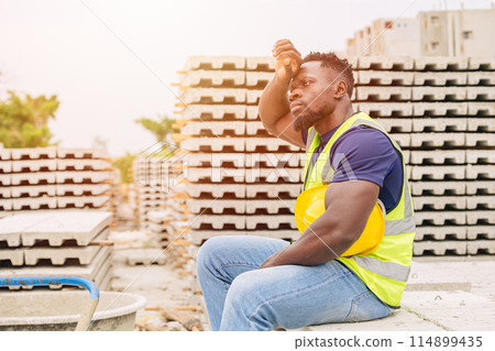 Tired stress hard worker feel bad sweating from hot weather in sunny day outdoor, Black African people global warming impact. 114899435