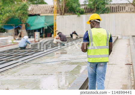 African black engineer worker working in Precast concrete casting manufacturing checking product quality standard outdoor construction site African black engineer worker working in Precast concrete casting manufacturing checking product quality standard outdoor construction site 114899441