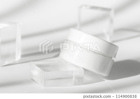 Minimalist skincare product with abstract shadows 114900838