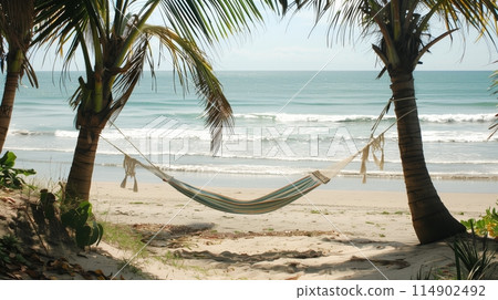 Beach Hammock Retreat: Between palms on a sandy shore, swaying gently, near soothing waves. 114902492