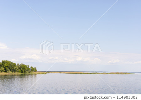 landscape, view of the shore of the reservoir, blue sky landscape, view of the shore of the reservoir, blue sky 114903302