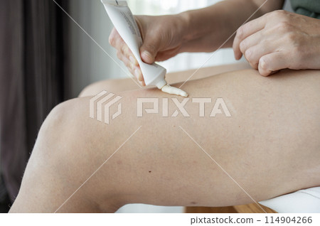 leg hair removal cream 114904266