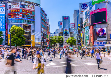 Tokyo cityscape in Japan, May, overlooking Shibuya Scramble Crossing and Shibuya 109. Dangerous driving of bicycles also seen = 17th 114905933
