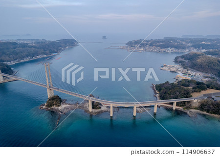 Drone photography | Yobuko Ohashi Bridge over Kabeshima Island in the Genkai Sea and townscape | Karatsu City, Saga Prefecture 114906637