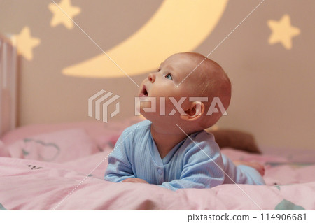 Dream Baby Nestled Among Moon and Stars in Bed, going to sleep. Dream Baby Nestled Among Moon and Stars in Bed, going to sleep. 114906681