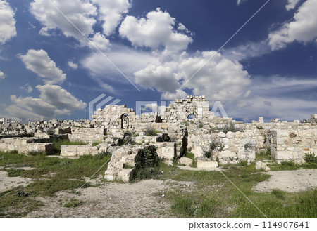 Amman city landmarks-- old roman Citadel Hill, Jordan. Against the background of a beautiful sky with clouds 114907641