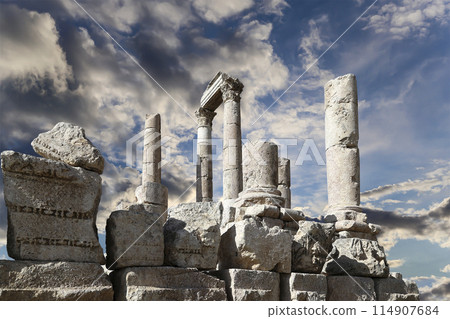 Amman city landmarks-- old roman Citadel Hill, Jordan. Against the background of a beautiful sky with clouds 114907684