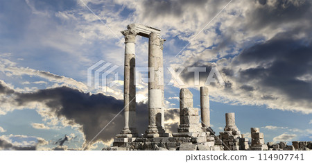 Amman city landmarks-- old roman Citadel Hill, Jordan. Against the background of a beautiful sky with clouds 114907741