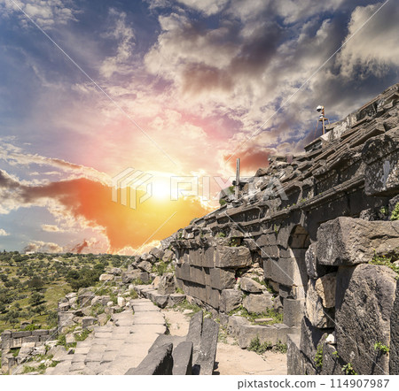 West Theatre of Umm Qais (Umm Qays)--is a town in northern Jordan near the site of the ancient town of Gadara, Jordan. Against the background of a beautiful sky with clouds 114907987