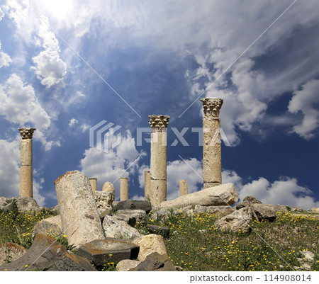 Roman ruins at Umm Qais (Umm Qays)--is a town in northern Jordan near the site of the ancient town of Gadara, Jordan. Against the background of a beautiful sky with clouds 114908014