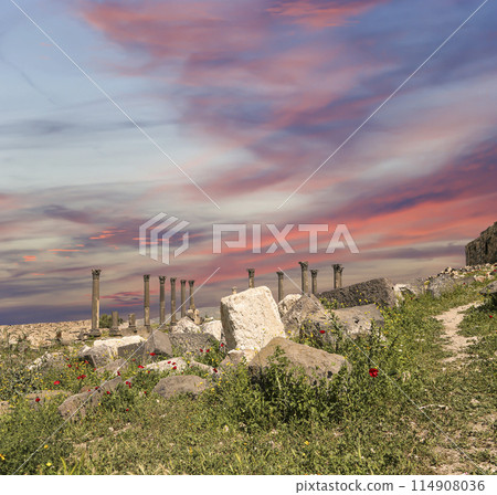Roman ruins at Umm Qais (Umm Qays)--is a town in northern Jordan near the site of the ancient town of Gadara, Jordan. Against the background of a beautiful sky with clouds 114908036