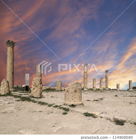 Roman ruins at Umm Qais (Umm Qays)--is a town in northern Jordan near the site of the ancient town of Gadara, Jordan. Against the background of a beautiful sky with clouds 114908080