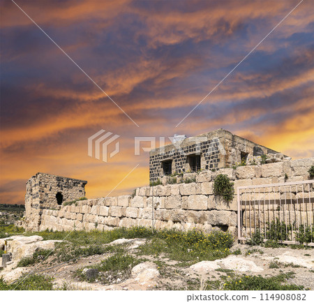 Roman ruins at Umm Qais (Umm Qays)--is a town in northern Jordan near the site of the ancient town of Gadara, Jordan. Against the background of a beautiful sky with clouds 114908082