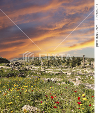 Roman ruins at Umm Qais (Umm Qays)--is a town in northern Jordan near the site of the ancient town of Gadara, Jordan. Against the background of a beautiful sky with clouds 114908084