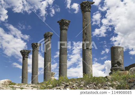 Roman ruins at Umm Qais (Umm Qays)--is a town in northern Jordan near the site of the ancient town of Gadara, Jordan. Against the background of a beautiful sky with clouds 114908085