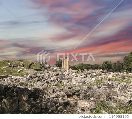 Roman ruins at Umm Qais (Umm Qays)--is a town in northern Jordan near the site of the ancient town of Gadara, Jordan. Against the background of a beautiful sky with clouds 114908195