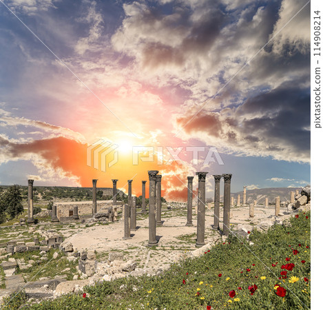 Roman ruins at Umm Qais (Umm Qays)--is a town in northern Jordan near the site of the ancient town of Gadara, Jordan. Against the background of a beautiful sky with clouds 114908214