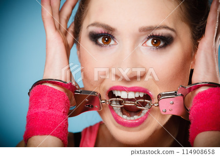 teen crime - teenager girl in handcuffs teen crime - teenager girl in handcuffs 114908658