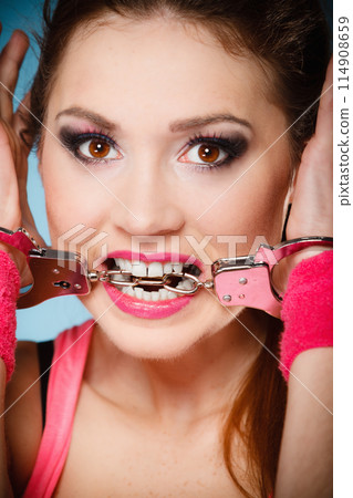 teen crime - teenager girl in handcuffs teen crime - teenager girl in handcuffs 114908659